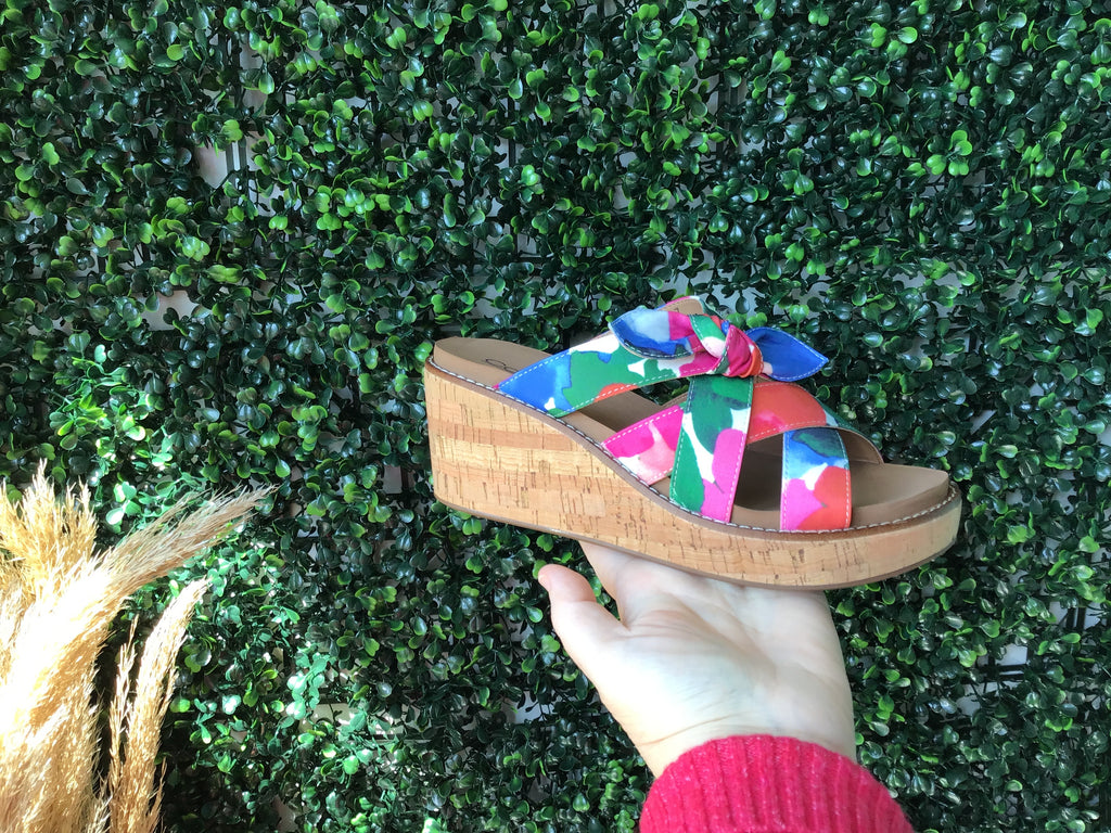 Corky’s floral bow wedge